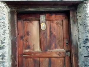 Religious door marker in Jou